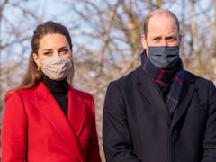 Wearing a protective face covering to combat the spread of the coronavirus, Britain's Catherine, Duc...