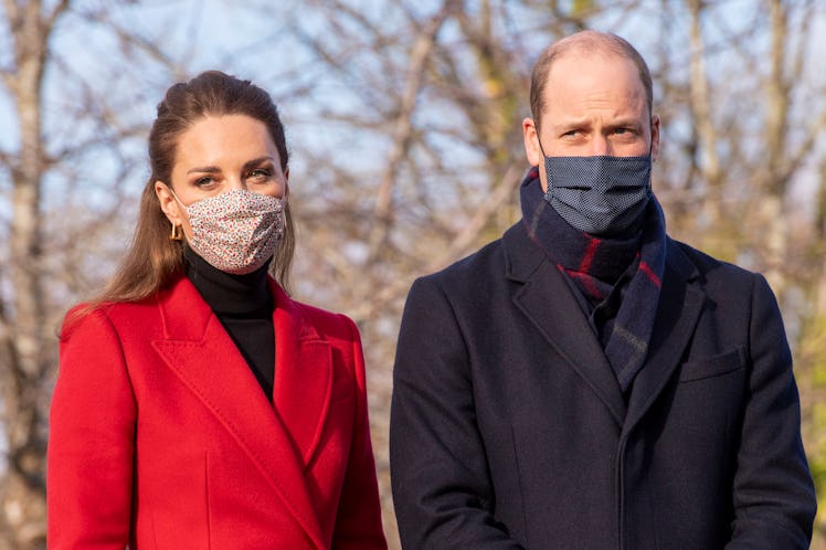 Wearing a protective face covering to combat the spread of the coronavirus, Britain's Catherine, Duc...