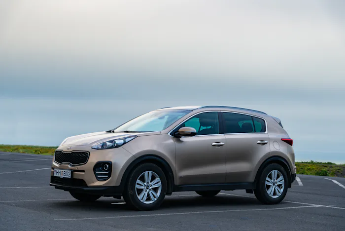 A Kia Sportage sits in a parking lot in south Iceland.