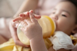 Drinking pumped stringy breast milk is just fine for babies.