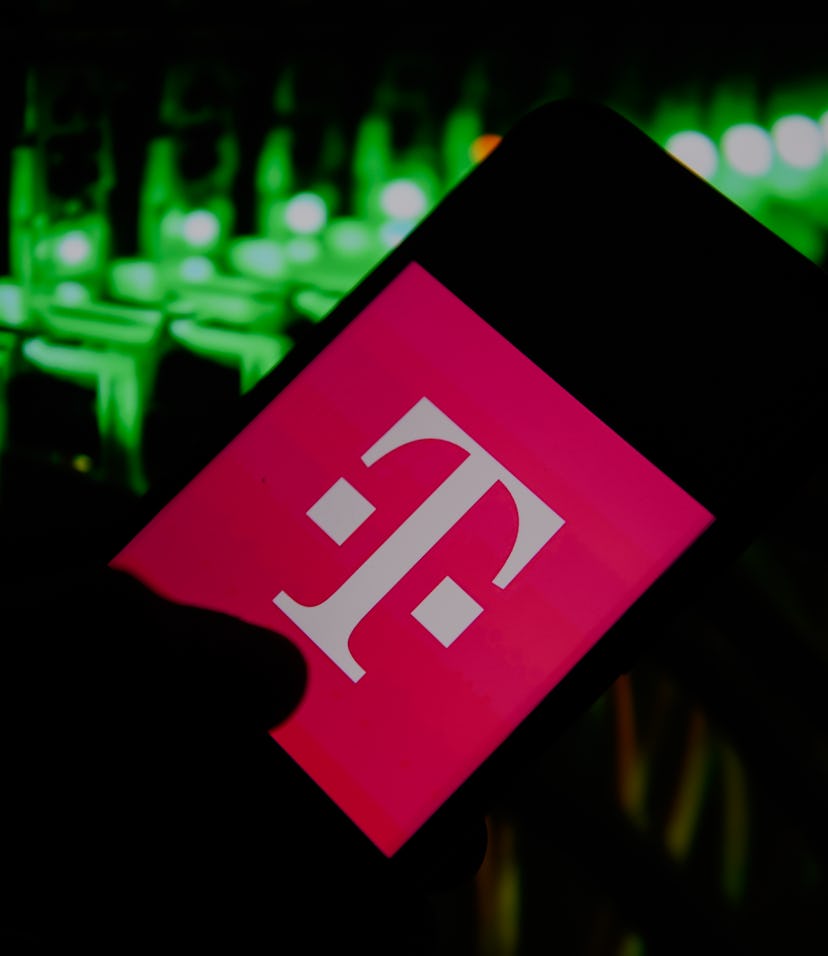 In this photo illustration a T Mobile logo seen displayed on a smartphone. (Photo Illustration by Om...