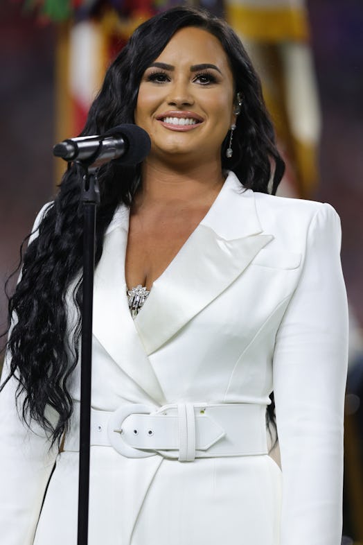 MIAMI, FLORIDA - FEBRUARY 02: Singer Demi Lovato performs the national anthem prior to Super Bowl LI...