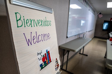 Carrizo Springs, TX- FEB 21: A welcome sign on display inside a classroom at a Influx Care Facility ...