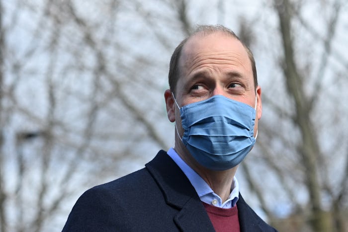 Britain's Prince William, Duke of Cambridge reacts to a question from the media as he leaves after a...