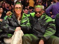 LOS ANGELES, CALIFORNIA - JANUARY 13: Kim Kardashian and Kanye West attend a basketball game between...