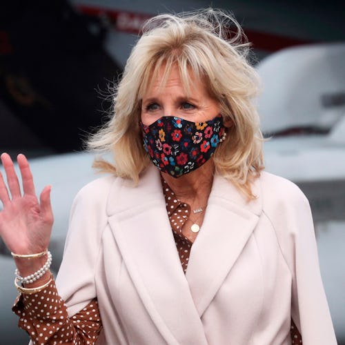 US First Lady Jill Biden waves as she is given a tour of Growler aircraft, March 9, 2021, at Naval A...