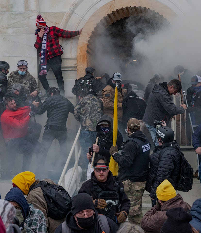 WASHINGTON DC, DISTRICT OF COLUMBIA, UNITED STATES - 2021/01/06: Police use tear gas around Capitol ...