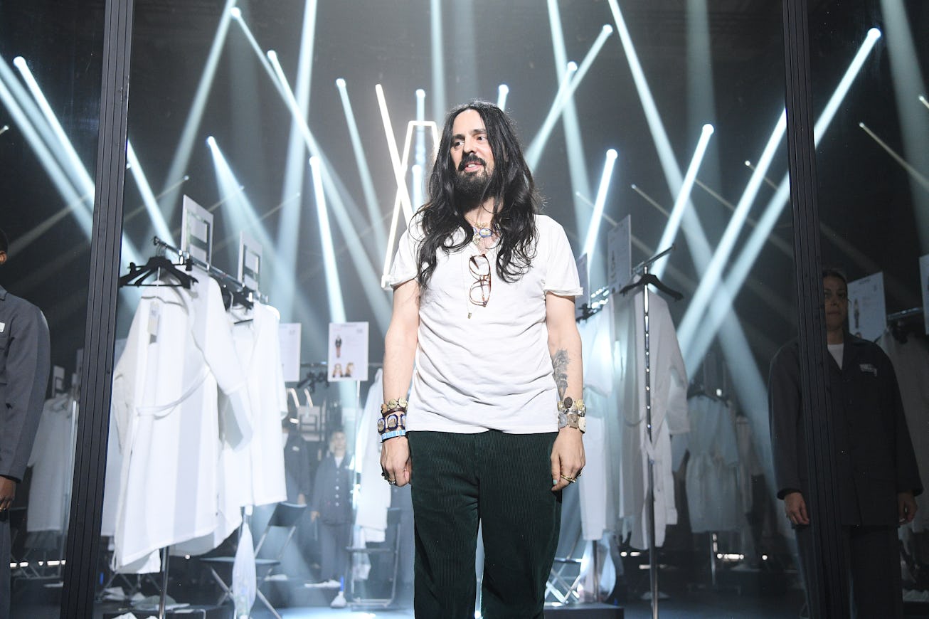 MILAN, ITALY - FEBRUARY 19: Fashion Designer Alessandro Michele acknowledges the appause of the audi...