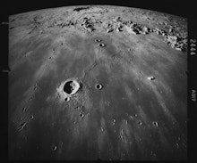 Image of the lunar surface, looking south across Mare Imbrium, with the crater Copernicus (58 miles ...