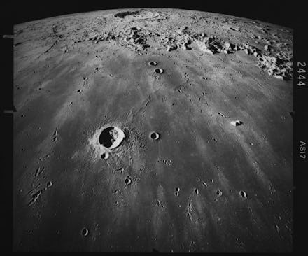 Image of the lunar surface, looking south across Mare Imbrium, with the crater Copernicus (58 miles ...