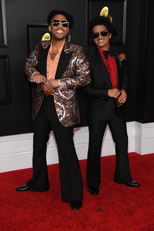 Anderson .Paak wearing a Gucci suit with Bruno Mars at the 2021 Grammys.