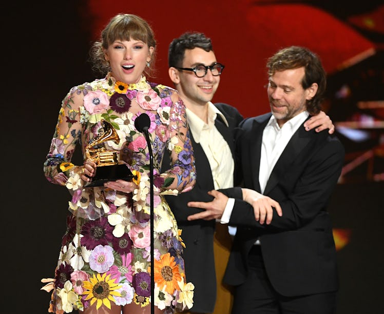 LOS ANGELES, CALIFORNIA - MARCH 14: (L-R) Taylor Swift, Jack Antonoff, and Aaron Dessner accept the ...