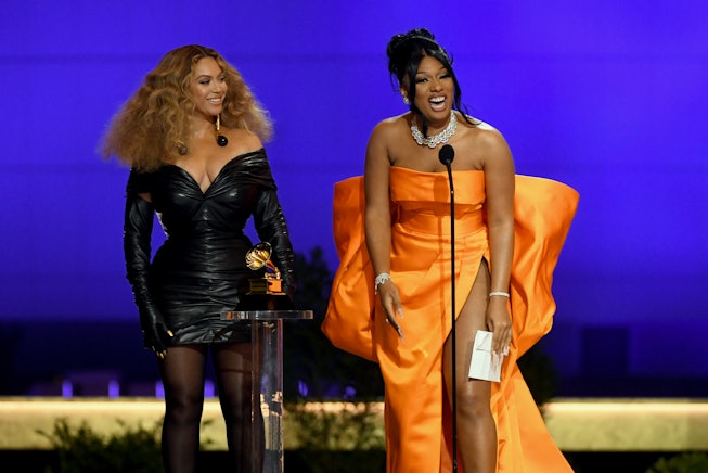 LOS ANGELES, CALIFORNIA - MARCH 14: (L-R) Beyoncé and Megan Thee Stallion accept the Best Rap Perfor...