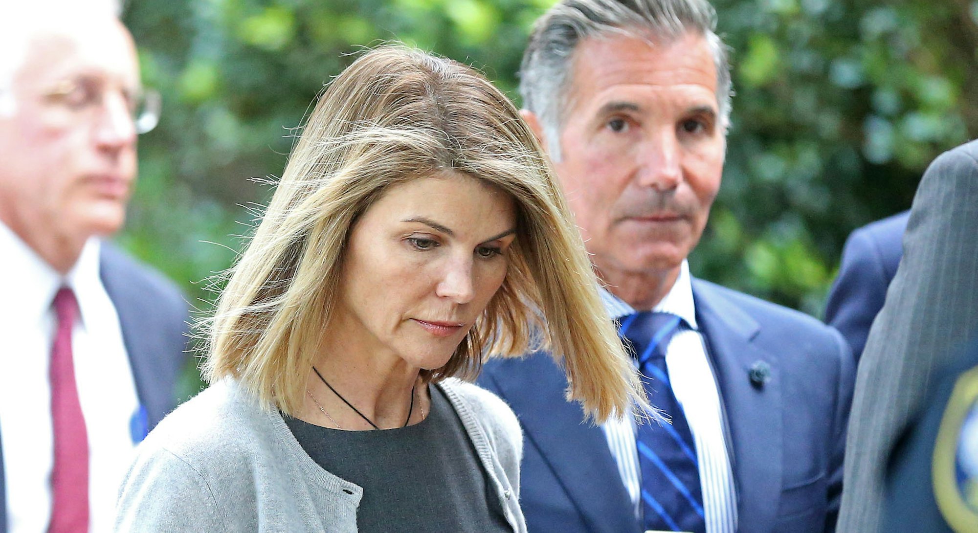 BOSTON MA. - AUGUST 27:  Actress Lori Loughlin and her husband Mossimo Giannulli leave Moakley Feder...