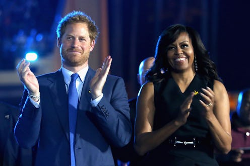 ORLANDO, FL - MAY 08: Prince Harry and Michelle Obama cheer during the Opening Ceremony of the Invi...