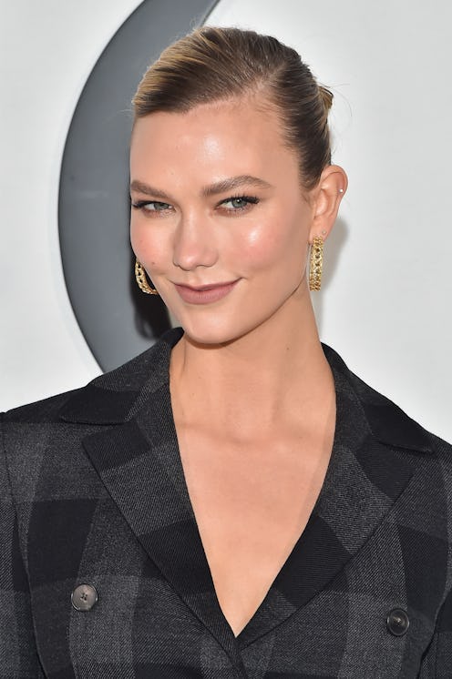 PARIS, FRANCE - FEBRUARY 25: (EDITORIAL USE ONLY) Karlie Kloss attends the Dior show as part of the ...