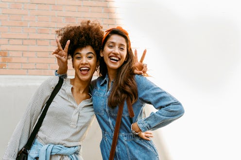 friends showing the peace sign