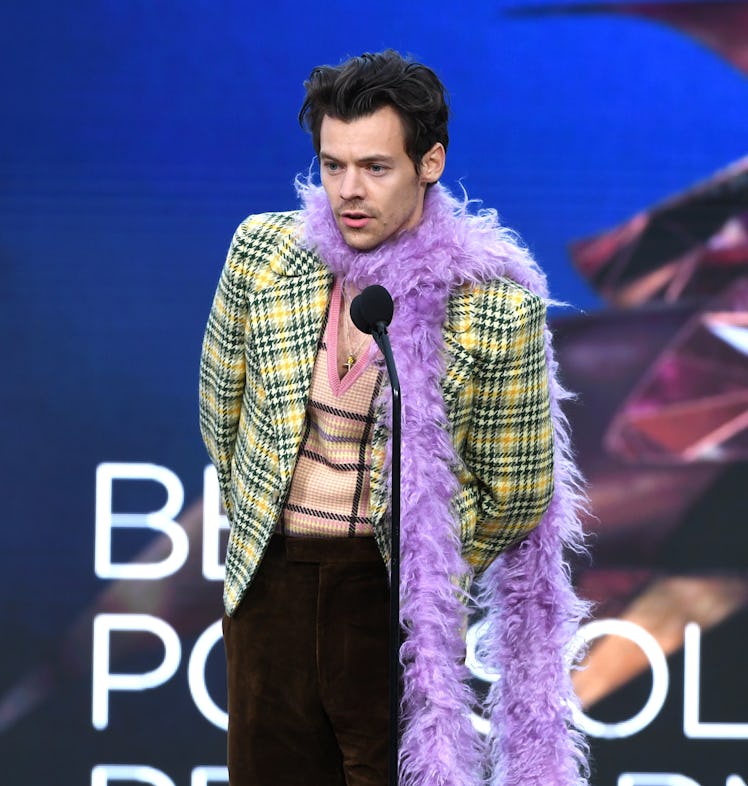 LOS ANGELES, CALIFORNIA - MARCH 14: Harry Styles accepts the Best Pop Solo Performance award for 'Wa...