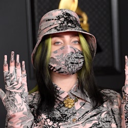 Billie Eilish's Grammy's look was a tiger print set that matched her nails and face mask.