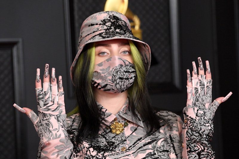 Billie Eilish's Grammy's look was a tiger print set that matched her nails and face mask.