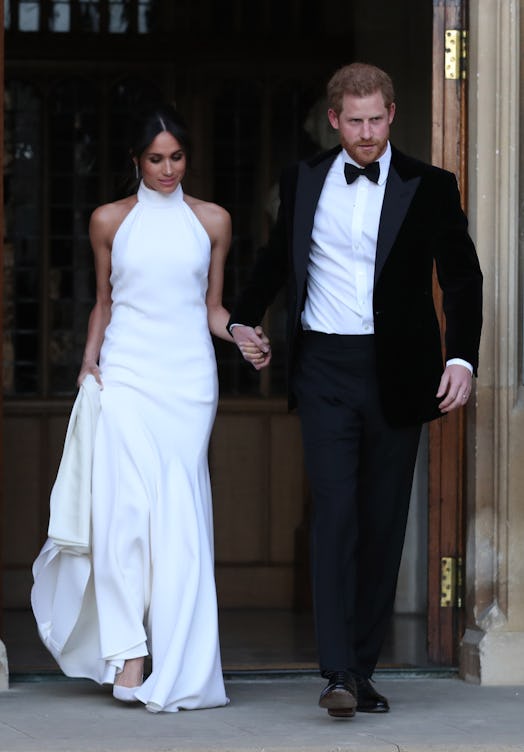 WINDSOR, UNITED KINGDOM - MAY 19: Duchess of Sussex and Prince Harry, Duke of Sussex leave Windsor C...