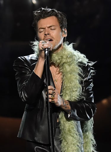 Harry Styles' 2021 Grammys Outfit Look Included A Green Feather Boa & His  Tattoos