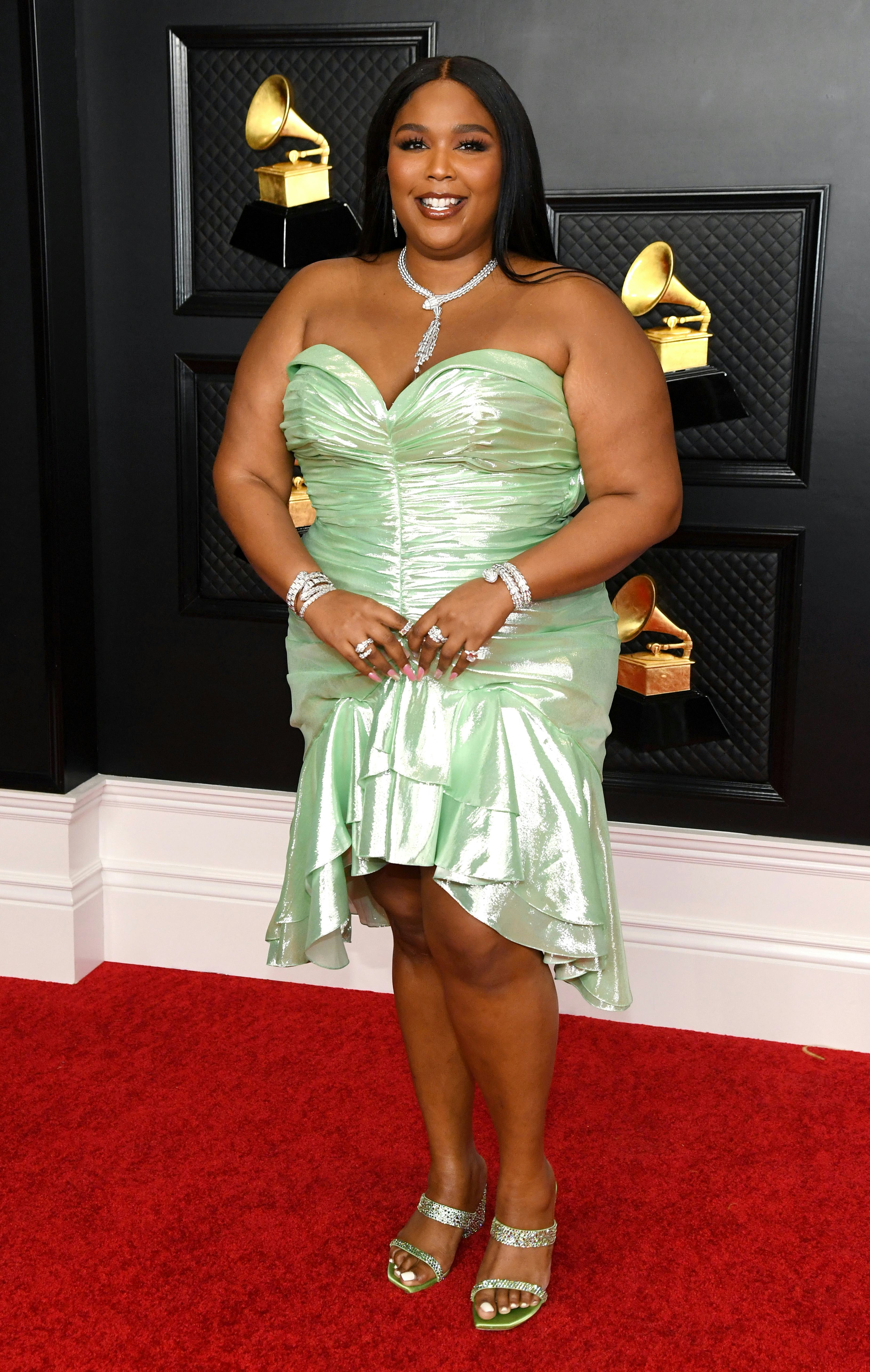 Lizzo wearing custom Balmain at the 2021 Grammys.