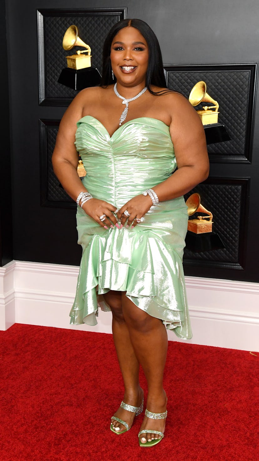 Lizzo wearing custom Balmain at the 2021 Grammys.