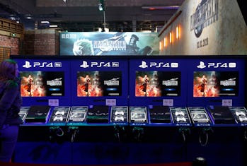 PARIS, FRANCE - OCTOBER 29: Sony PlayStation game consoles PS4 Pro with the logo of the video game '...