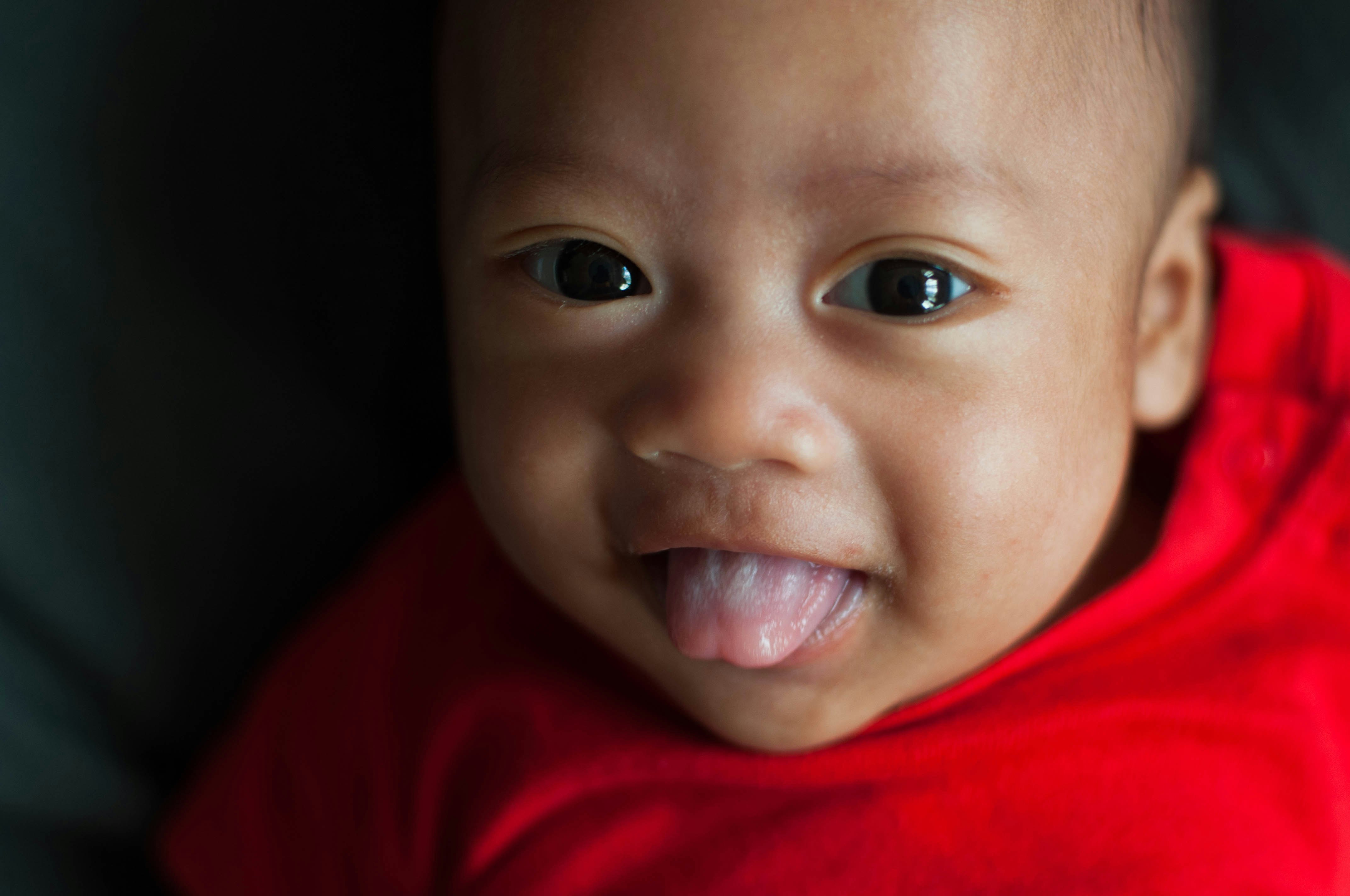 10 week old baby sticking hot sale tongue out