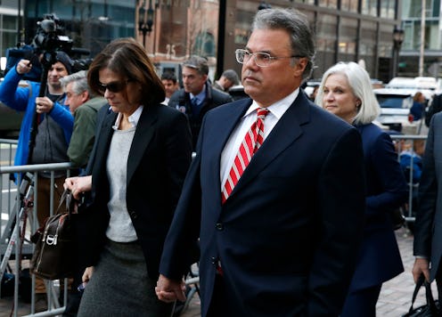 BOSTON, MA - APRIL 3: Manuel, right, and Elizabeth Henriquez leave the John Joseph Moakley United St...