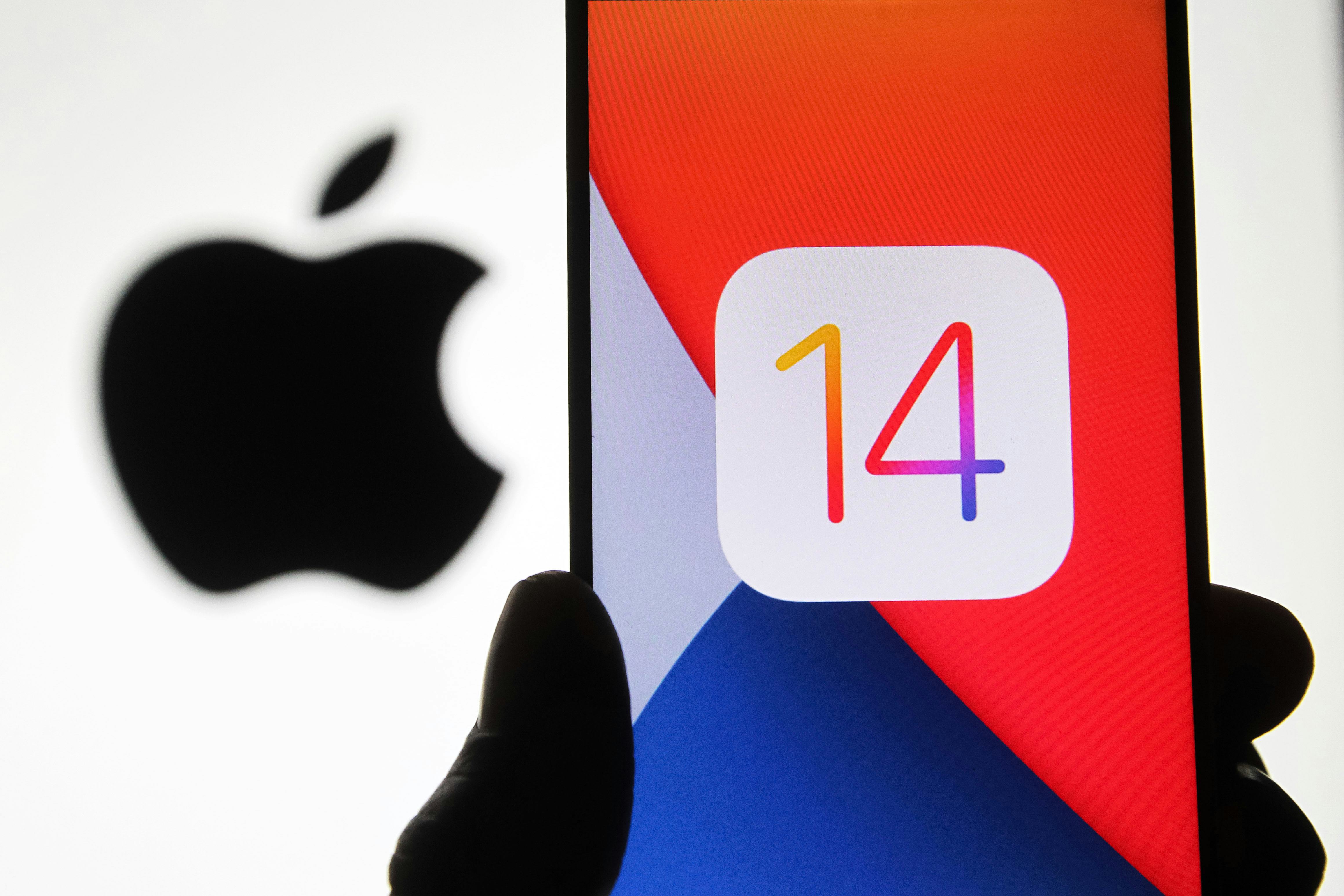 UKRAINE - 2020/10/14: In this photo illustration the iOS 14 logo of the iOS mobile operating system ...
