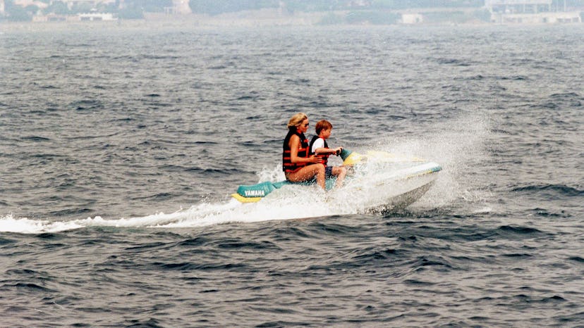 Princess Diana and Prince Harry try out a jet ski in 1997.
