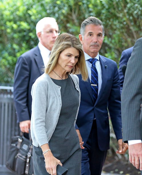 BOSTON MA. - AUGUST 27:  Actress Lori Loughlin and her husband Mossimo Giannulli leave Moakley Feder...