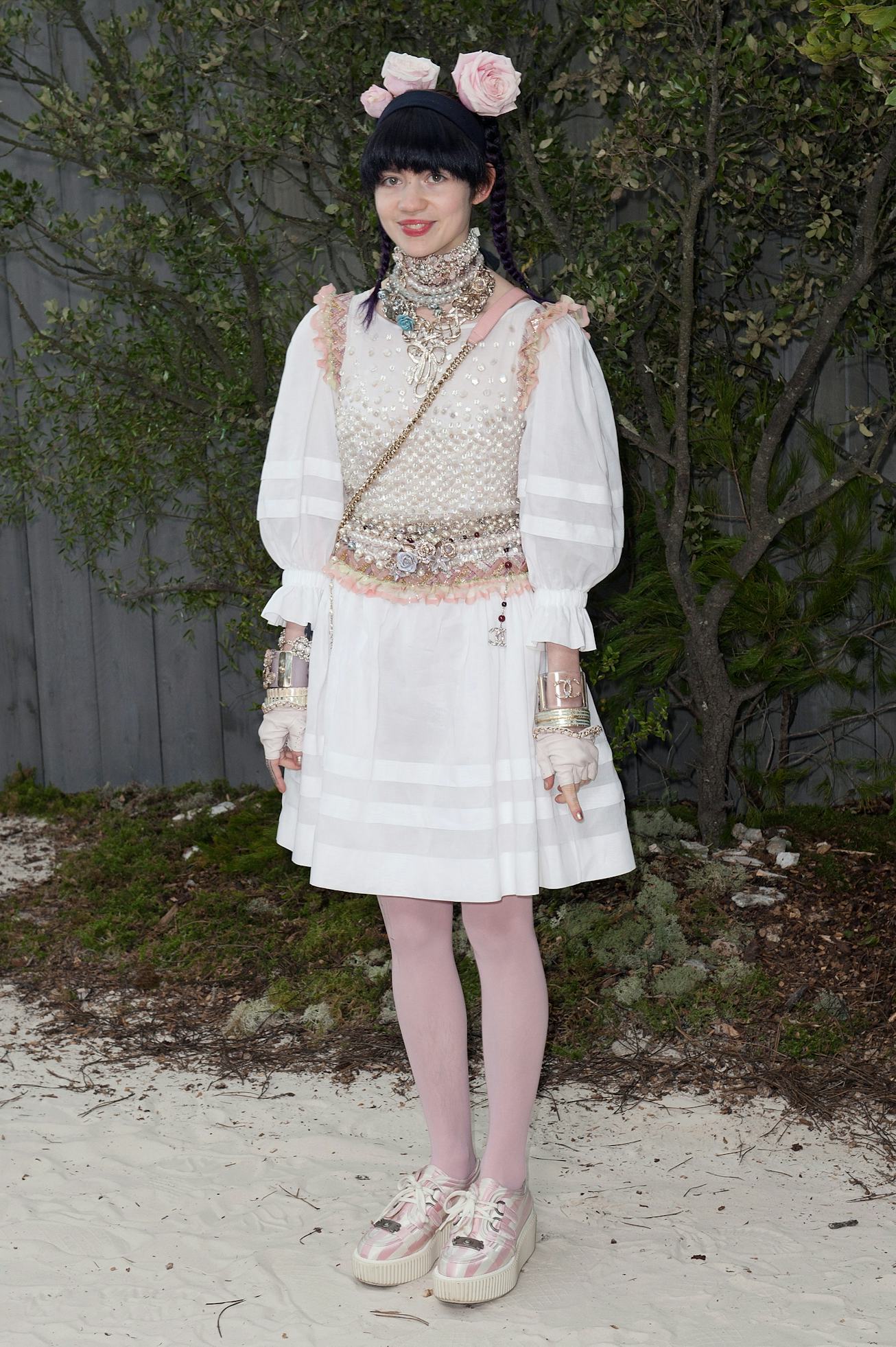 Grimes attends the Chanel Spring/Summer 2013 Haute-Couture show in 2013.