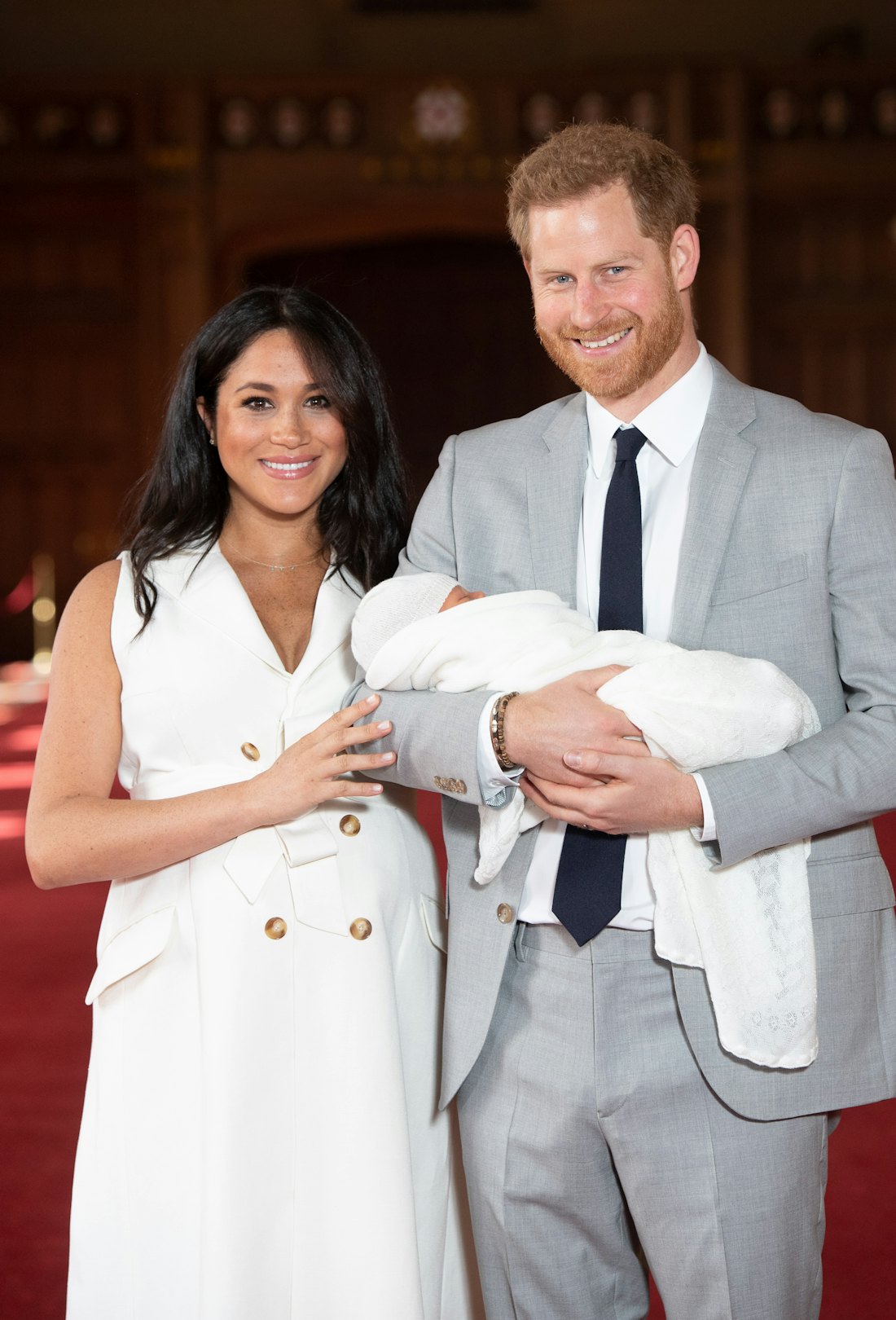 Prince Harry, Duke of Sussex and Meghan, Duchess of Sussex, pose with their newborn son Archie Harri...