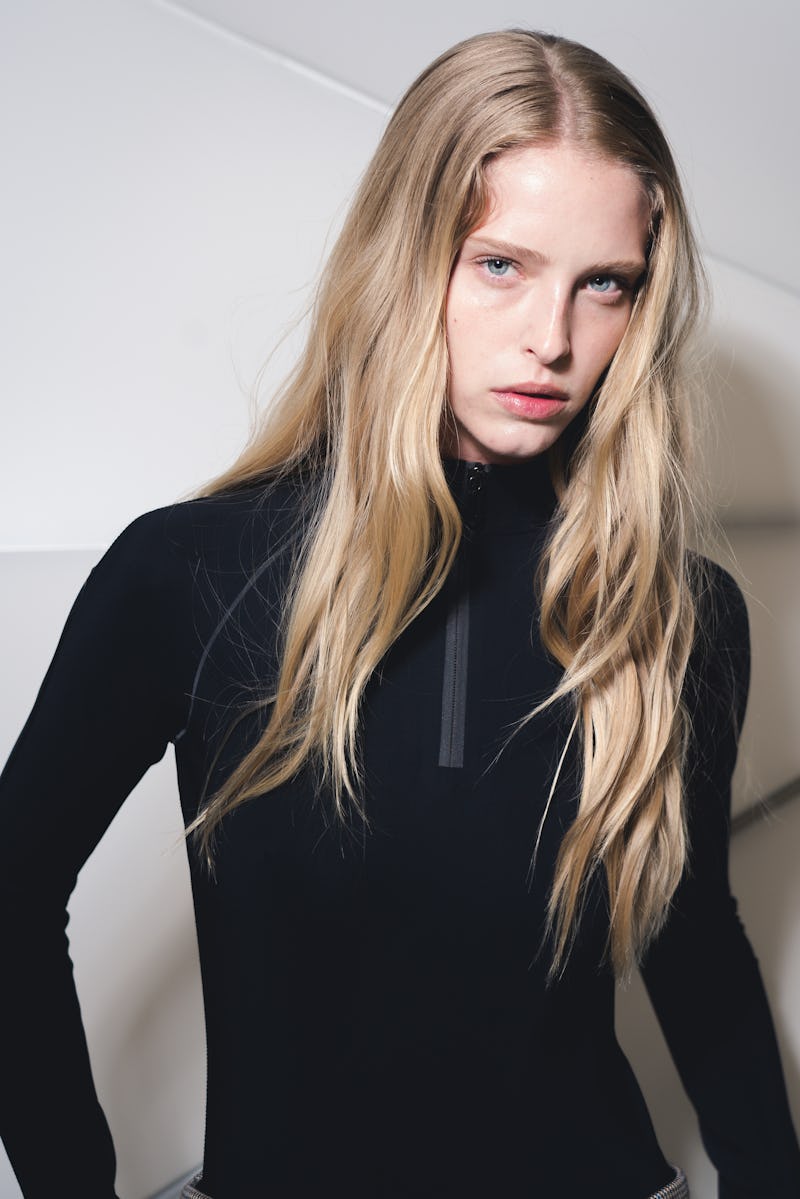 PARIS, FRANCE - MARCH 04: (EDITORIAL USE ONLY) A model is seen Backstage prior to the Coperni show a...