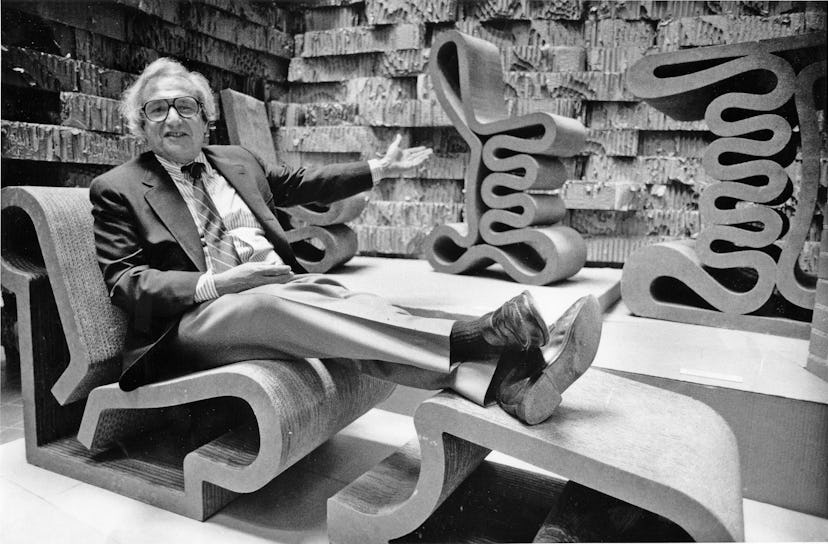 TORONTO, ON: Architect Frank Gehry sits on one of his cardboard chairs, photo taken by Boris Spremo/...