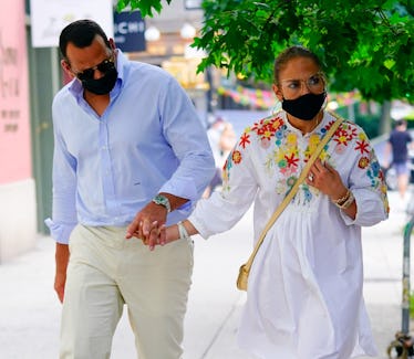 NEW YORK, NEW YORK - AUGUST 05: Jennifer Lopez and Alex Rodriguez wear protective face masks on Augu...