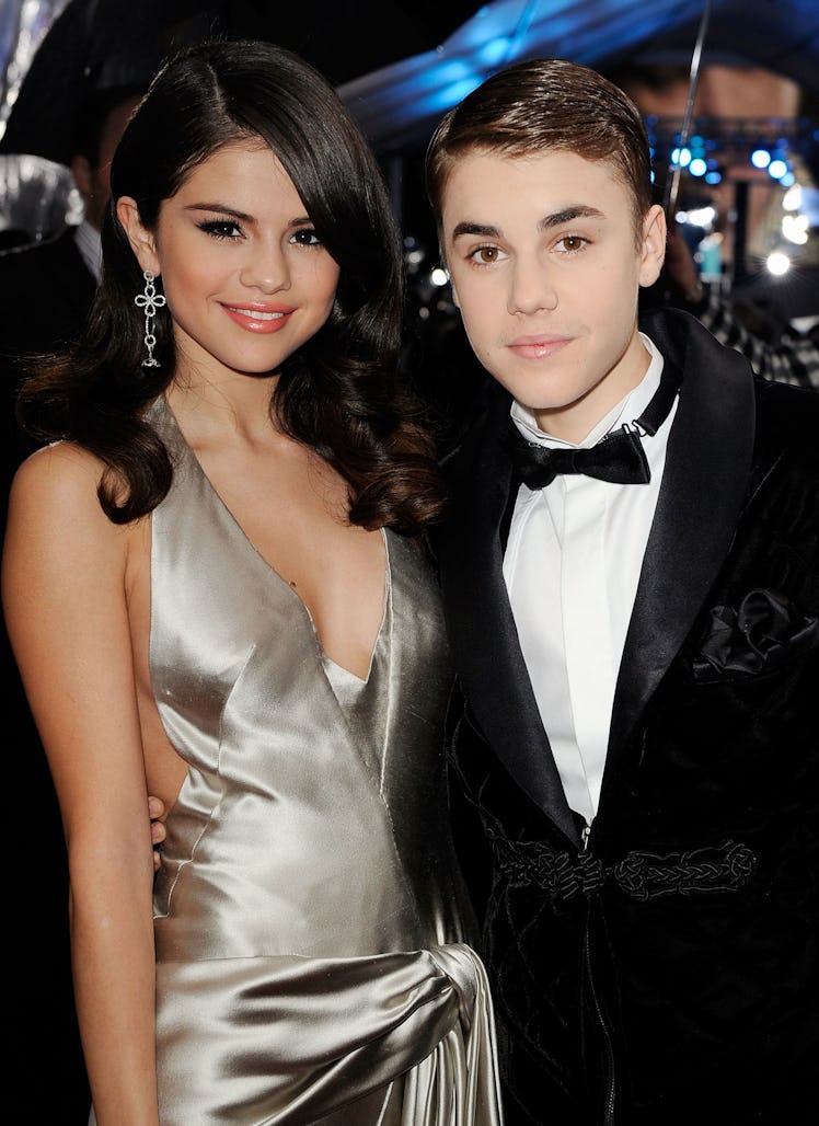 LOS ANGELES, CA - NOVEMBER 20: Singers Selena Gomez and Justin Bieber arrive at the 2011 American M...