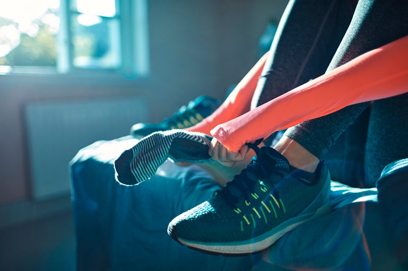 Close up of a woman getting ready for a workout