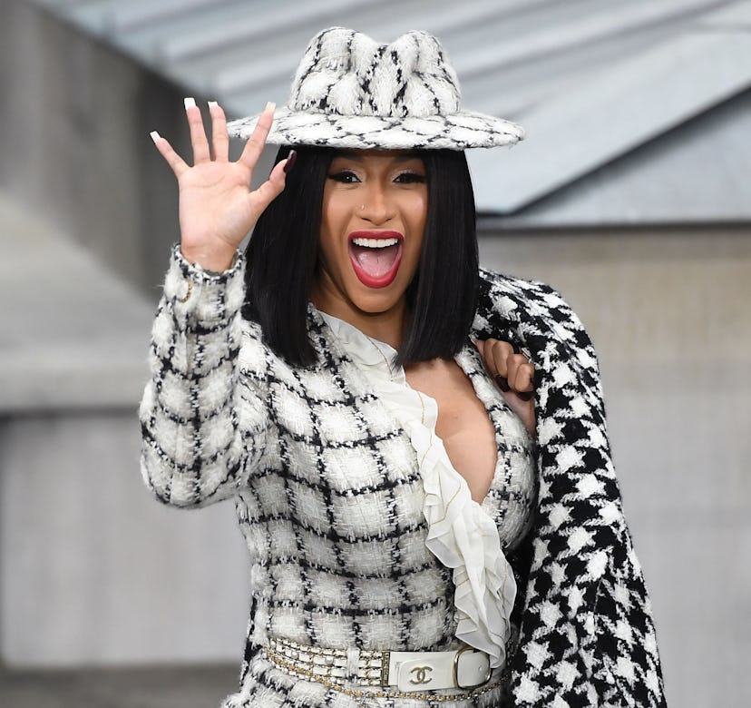 US rapper Cardi B waves as she arrives prior to the Chanel Women's Spring-Summer 2020 Ready-to-Wear ...