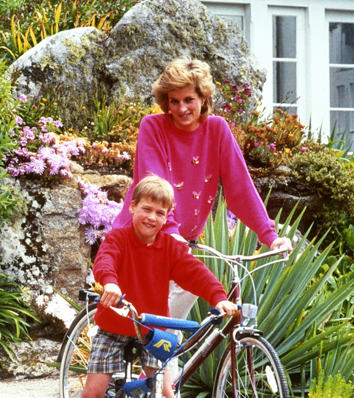 Diana, Princess of Wales with son Prince William, prepare for a cycling trip in Tresco during their ...