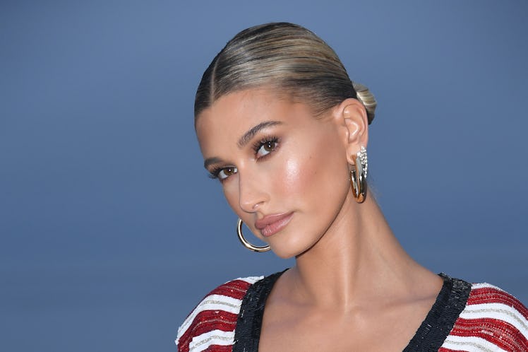 US model Hailey Baldwin arrives for the Saint Laurent Men's Spring-Summer 2020 runway show in Malibu...