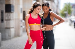 BERLIN, GERMANY - AUGUST 13: Dora Molina wearing red sports leggings and red yellow cropped top Fabl...