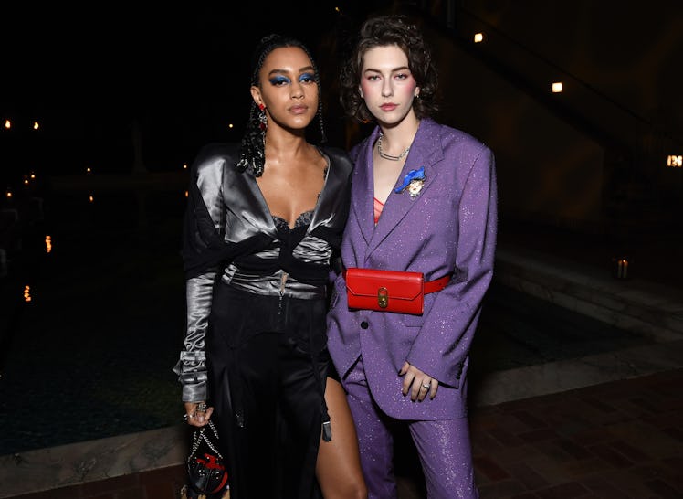 LOS ANGELES, CALIFORNIA - DECEMBER 05: Quinn Wilson (L) and King Princess attend the Christian Loubo...