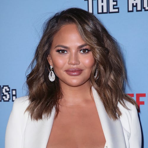 Chrissy Teigen's new hand tattoos are a chic take on the micro-ink trend.