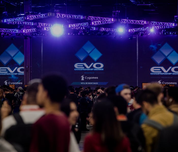LAS VEGAS, NV - AUGUST 03: Attendees walk between tournament games during day one of EVO 2018 at th...