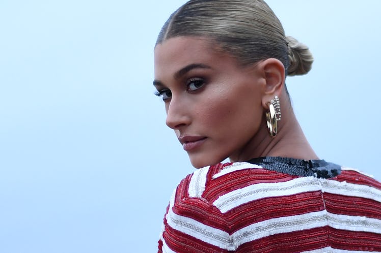 US model Hailey Baldwin arrives for the Saint Laurent Men's Spring-Summer 2020 runway show in Malibu...