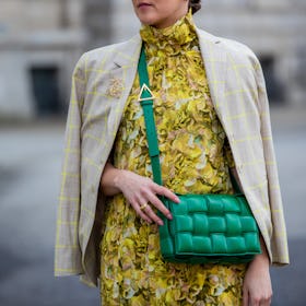 BERLIN, GERMANY - MARCH 15: Tina Haase is seen wearing yellow Baum & Pferdgarten dress with floral p...